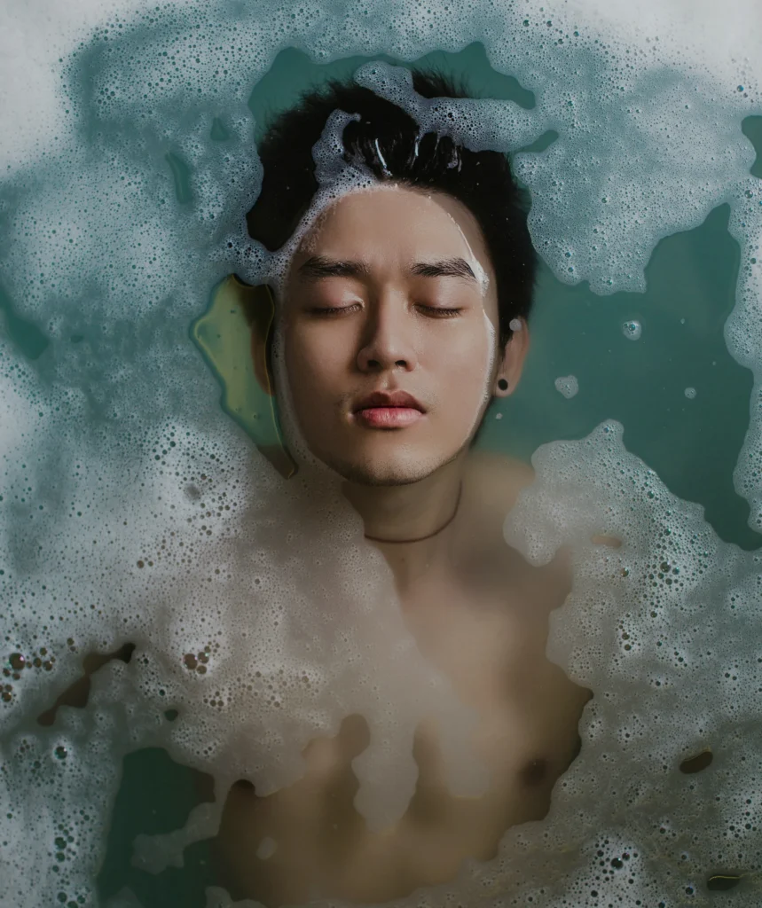 man in water with bubbles